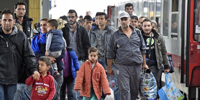 Réfugiés syriens , l'Allemagne et le Canada accueillent bien plus que la France