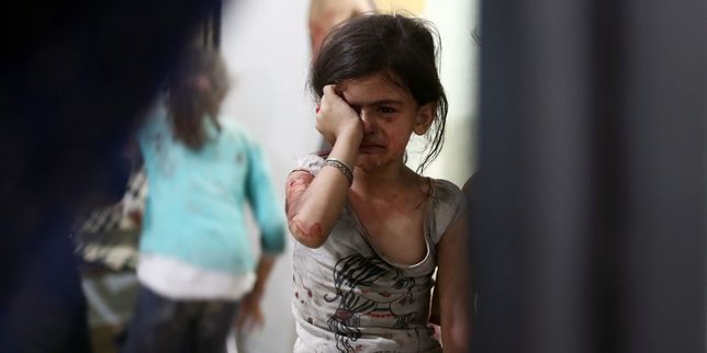 Un photographe raconte son quotidien auprès d' autres  enfants dans l'enfer syrien
